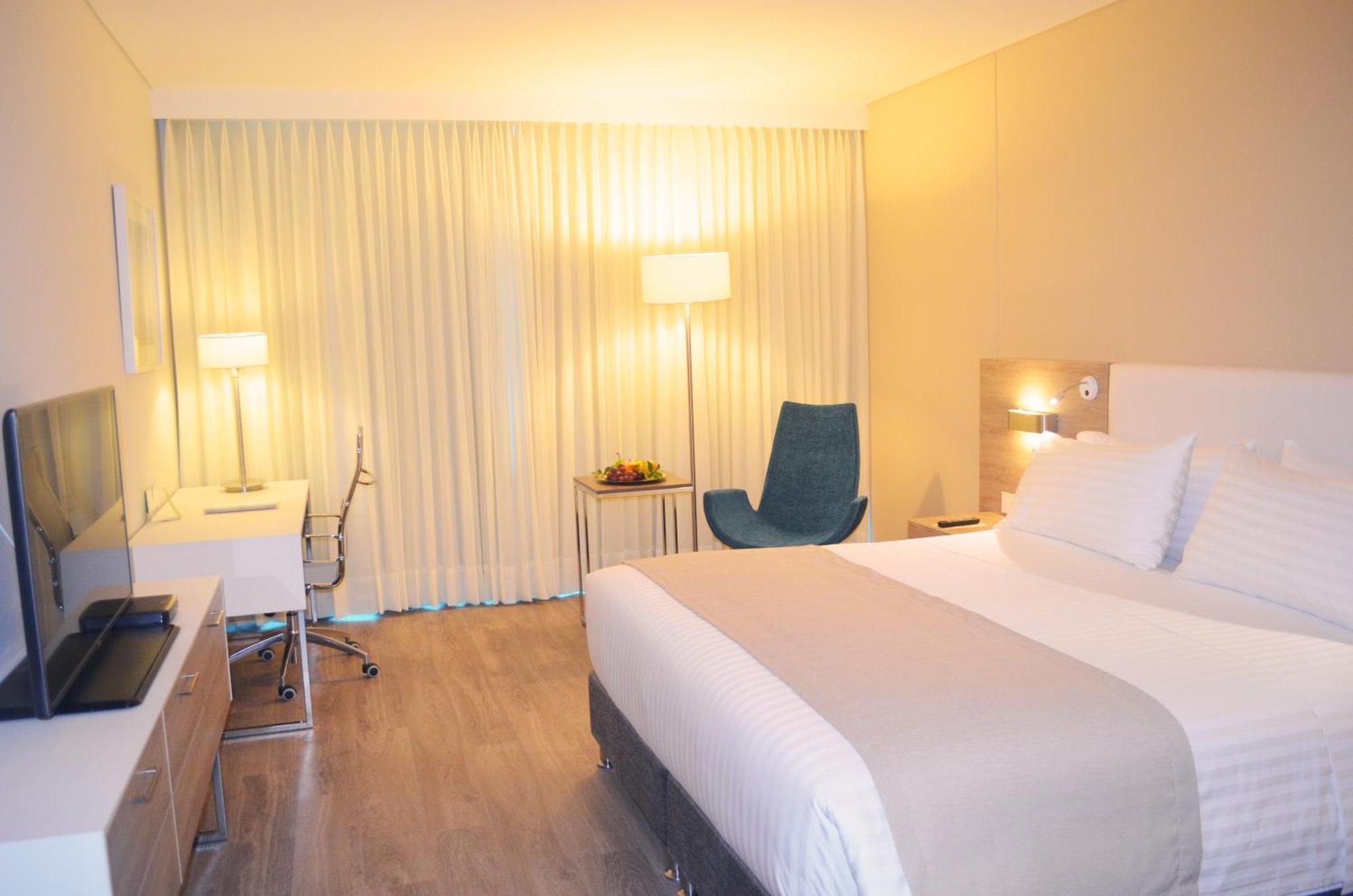 Holiday Inn Cucuta By Ihg Exterior foto A room at the hotel